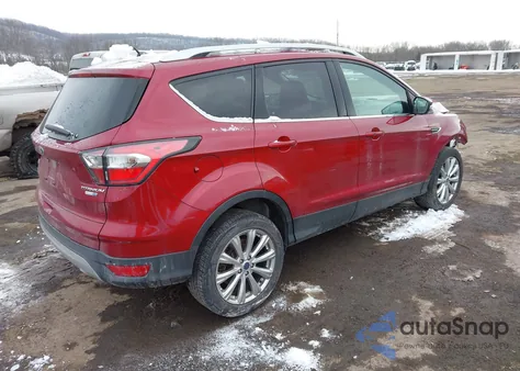 2017 Ford Escape Titanium z USA, uszkodzony, nr VIN 1FMCU9JD6HUA30708